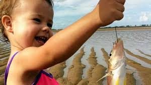 excited child fishing